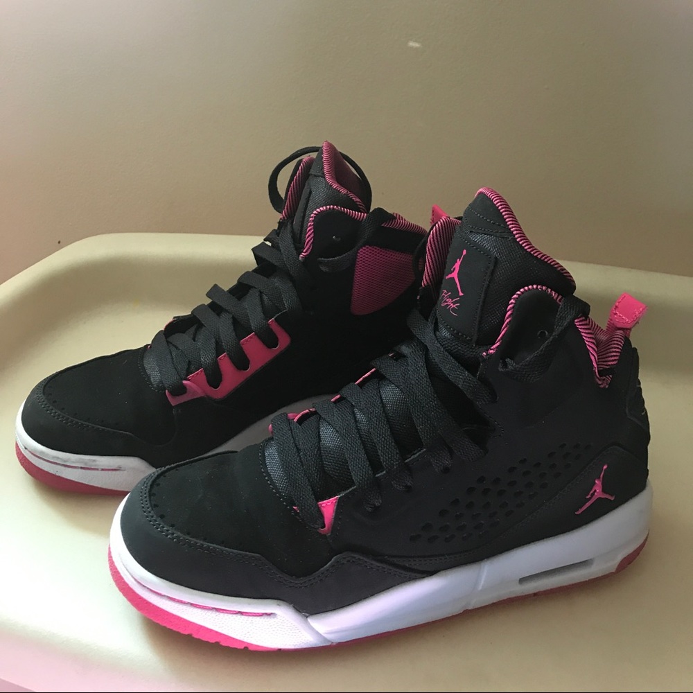 Pink/black Jordan shoes